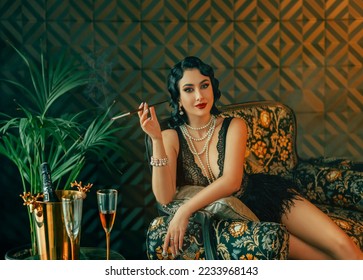1920s style Happy sexy flapper woman sitting on sofa, short black dress ostrich feather. girl holding mouthpiece in hand. golden classic luxury interior room. white pearl beads, cold wave hairstyle