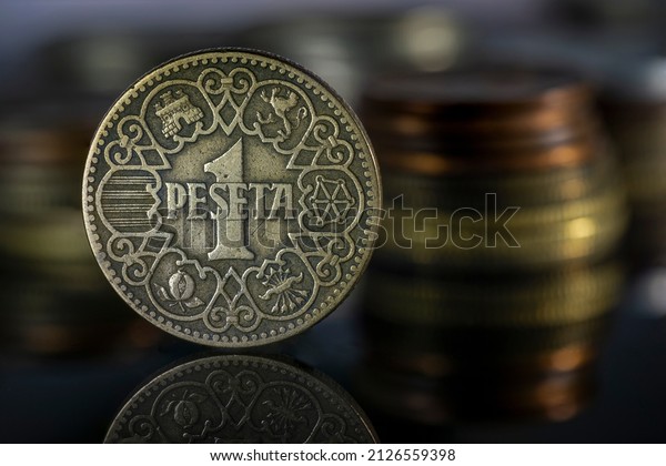 1944\
Spanish Peseta Coin Stacks Close Up\
Reflection