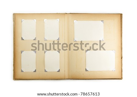 1950s photo album, opened with six pictures, isolated on white.