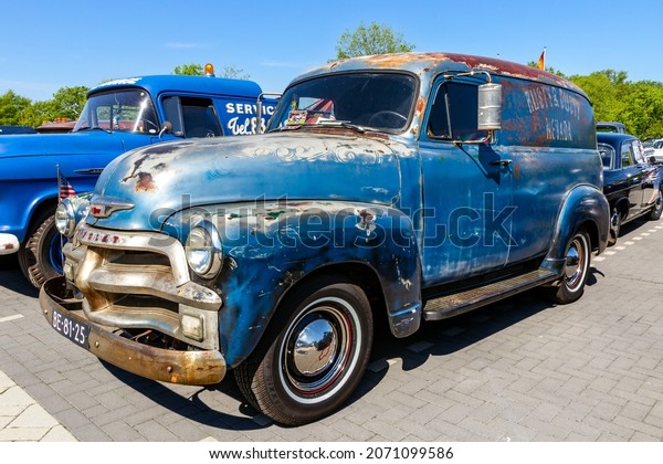 1954 Chevrolet Panel Van\
classic truck on the parking lot. Rosmalen, The Netherlands - May\
8, 2016