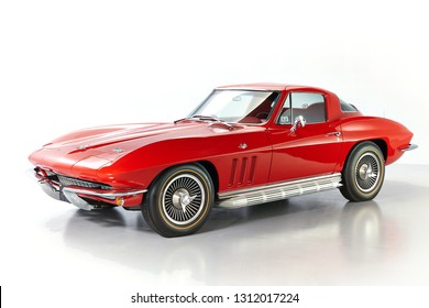 1966 Chevrolet Corvette Stingray Coupe
 Red On A White Background. Isolated