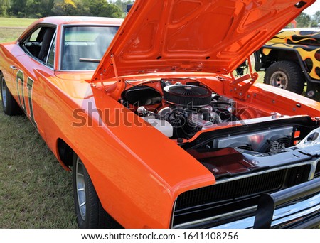 1969 Orange Dodge Charger car with bonnet open