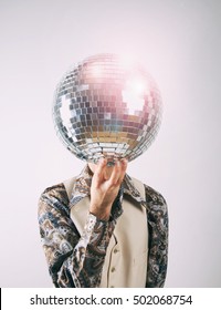 1970s Disco Man In Leisure Suit With A Glittering Disco Mirror Ball For A Head