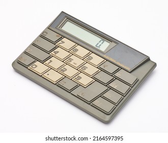 1980 Old Vintage Calculator. Retro  Electronic Calculator Isolated On White Background. Atari Japan Design.