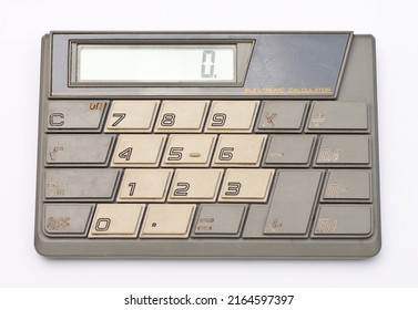 1980 Old Vintage Calculator. Retro  Electronic Calculator Isolated On White Background. Atari Japan Design.