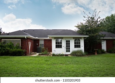 1980's Brick Ranch House In The Suburbs