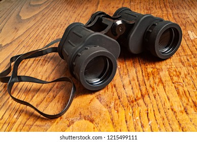 1980s Original Binoculars. Kitchen Wood Table Inside A Private Apartment. Italy Europe