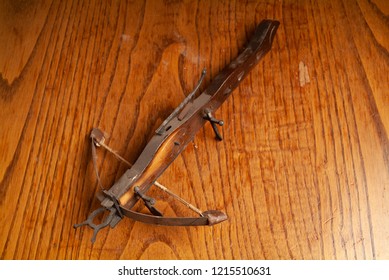 1980s Working Original Crossbow. Kitchen Wood Table Inside A Private Apartment. Italy Europe