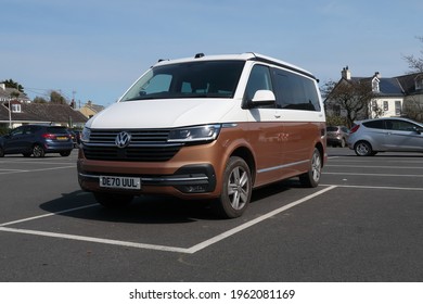 19th April 2021- A stylish Volkswagen California Ocean Tdi S-A, large five door family Mpv, parked in the public carpark at Amroth, Pembrokeshire, Wales, UK.
