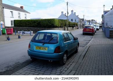 1st April 2022- An Old Toyota Starlet S, Small Five Door Hatchback Car, Parked On The Main Street In St Clears, Carmarthenshire, Wales, UK.