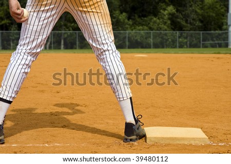 1st Baseman with ball in hand without any other players in view