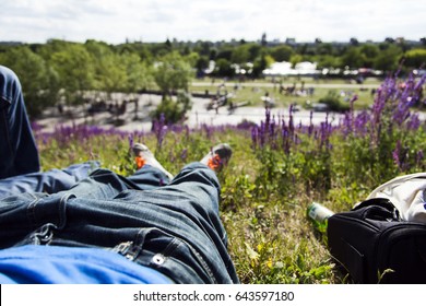 1st Person View Of His Own Legs On The Grass In Mauerpark In Berlin.