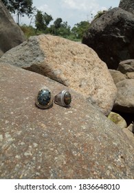 2 Agate Is On Top Of A Large Rock In The River