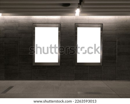 2 blank vertical advertising banners posters mockup in underground tunnel walkway; out-of-home OOH media display space, lightbox; 6 sheet template.