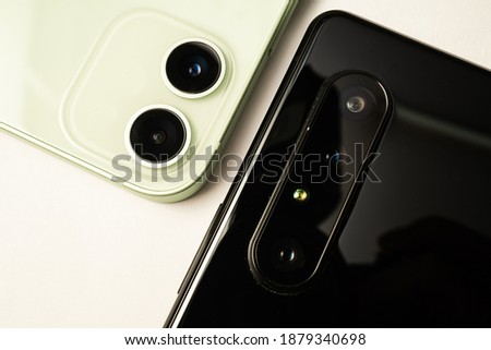 2 camera phones vs 3 camera phones. development of mobile cameras