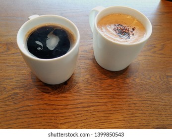 2 coffee mug on table - Shutterstock ID 1399850543