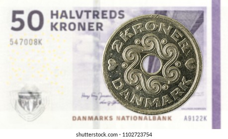 2 Danish Krone Coin Against 50 Danish Krone Note