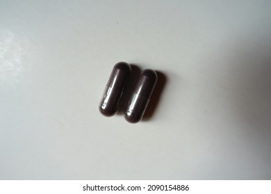 2 Dark Purple Capsules Of Bilberry Extract Dietary Supplement