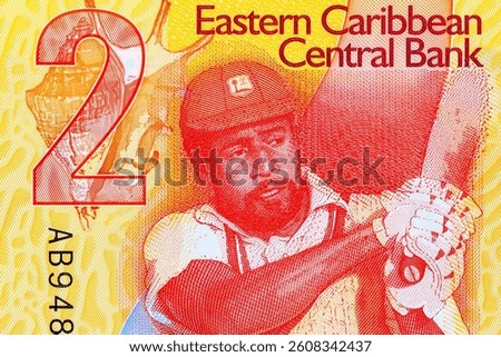2 Dollars Eastern Caribbean, Commemorative banknote with a portrait of Cricket player Sir Viv Richards. Eastern Caribbean money
