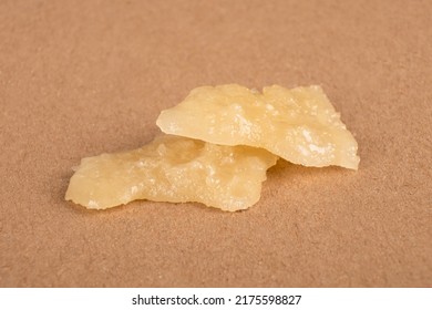 2 Golden-white Pieces Of Cannabis Wax With A High Thc.