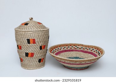 2 jute weaved storage containers or articles