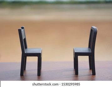 2 Little Cute Chairs Facing Each Other.