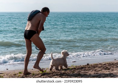 2 Mai, Romania - July 13, 2017: People Walking On The Beach. Real People.