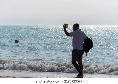 2 Mai, Romania - July 13, 2017: People Walking On The Beach. Real People.