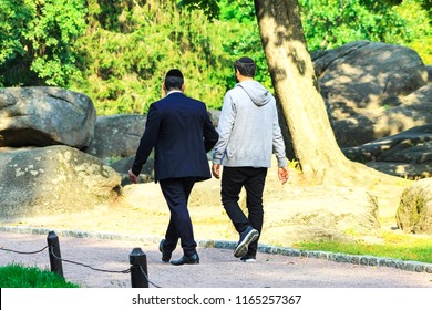 2 man, the Hasidim Jews are walking in the park in Uman, Ukraine, the time of the Jewish New Year, religious Jew