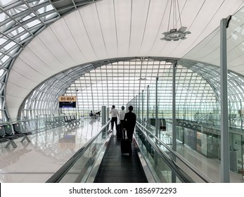 2 Oct 20, Bangkok Airport, Thailand. Flight Crew Walking In Modern Airport Terminal To Board The Aircraft.