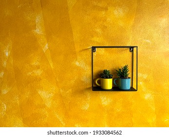 2 Potted Plants Hanging On The Wall, Bright Yellow. 