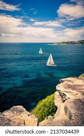 2 Sailboats On A Sunny Day