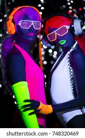 2 Sexy Cyber Glow Raver Women Filmed In Fluorescent Clothing Under UV Black Light