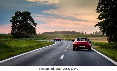 2 Sports cars on amazing winding district road - driving for fun. Mazda MX-5 ND RF. Miata. Amazing winding road. Green background HD. Wallpaper 4k.
