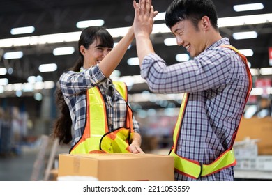 2 Staff Worker Working In The Large Depot Storage Warehouse Happy Smiling Packing Box At Cashier Counter