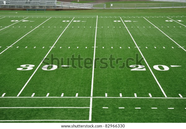 20 and 30\
Yard Line on American Football\
Field