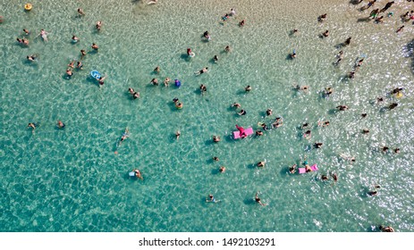 20 AUGUST 2019 Incekum Beach - Marmaris Turkey. Aerial top view of people swimming beautiful turquoise sandy sea and resting at sandy beach - crowded beach