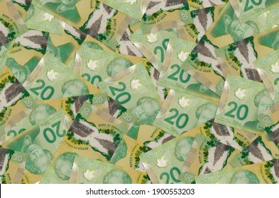 20 Canadian Dollars Bills Lies In Big Pile. Rich Life Conceptual Background. Big Amount Of Money