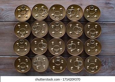 20 Cans. Food Stock For Long-term Storage. Dog And Cat Food In A Can. Texture Of The Lids Of Cans. Canned Food, Preserves, Products With A Long Shelf Life.