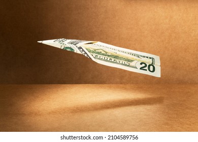 20 Dollar Bill Folded Into Paper Airplane