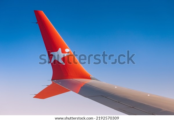 20 July
2022, Antalya, Turkey: Corendon airline logo on a winglet. Airplane
wing view from the window during a flight on vacation. Beautiful
sky and curved winglet for fuel
economy