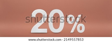 20 per cent. 20 discount, drop or increase. The number 20 percent is white on a red background as a symbol of a change in price or quantity. Photo,dimensional figures, standing, casting a shadow.