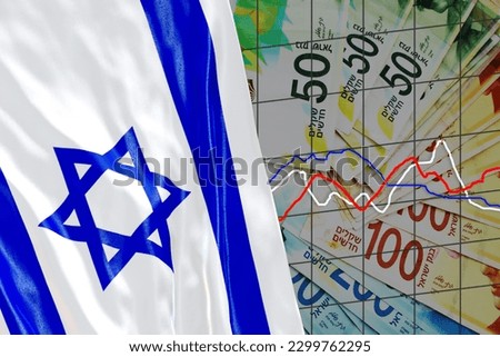 200, 100, 50 Sheqel banknotes and waving Israeli Flag. Israeli Shekels Banknotes, Israel Flag and Analytic Graphs. Concept: Israel Economy, Finance and Cash Money, Bank, Mortgage, Business in Israel