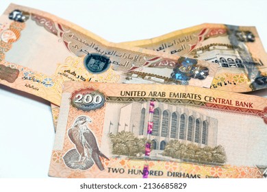 200 AED Two Hundred Dirhams Banknote Of United Arab Emirates, Obverse Side Has Zayed Sports City Stadium And Sharia Court Building, Reverse Side Has Central Bank Of The UAE And A Falcon Image