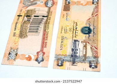 200 AED Two Hundred Dirhams Banknote Of United Arab Emirates, Obverse Side Has Zayed Sports City Stadium And Sharia Court Building, Reverse Side Has Central Bank Of The UAE And A Falcon Image