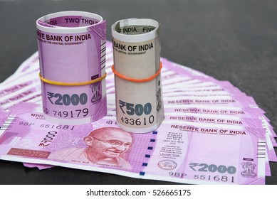 2000 And 500 Rupee Banknote India,The Brand New Indian Currency Notes Of 2000 And 500 Rupees Isolated On Black. These Have Been Introduced To Curb Black Money. Success And Got Profit From Business