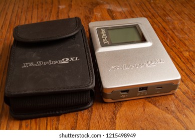 2000s Early Mp3 Music And Card Reader. Kitchen Wood Table Inside A Private Apartment. Italy Europe