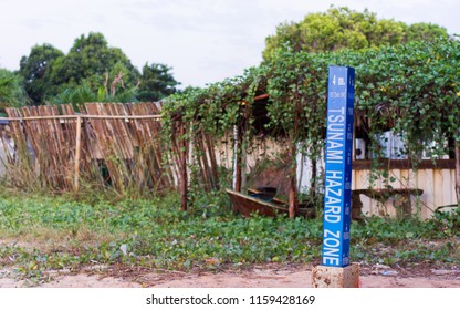 2004 Tsunami Height Marker In Thailand. Tsunami Hazard Zone Warning Sign.