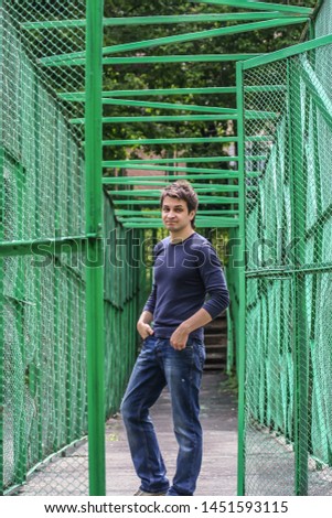 Similar – young tourist walks around the summer city