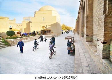 2013 November 08,  Local people and tourists at Itchan Kala (Xiva Ichon Qala) UNESCO world heritage, Central Asia, Khiva, Uzbekistan.